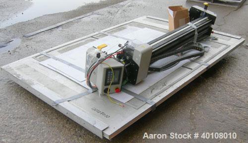 Used: Gerber cutting edge digital cutting system, model  DCS2500. Designed as a table top size plotter/cutter. Includes a model DCS2500 carriage assembly,65" wide x 96" long reverse air hold down tab...