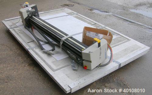 Used: Gerber cutting edge digital cutting system, model  DCS2500. Designed as a table top size plotter/cutter. Includes a model DCS2500 carriage assembly,65" wide x 96" long reverse air hold down tab...