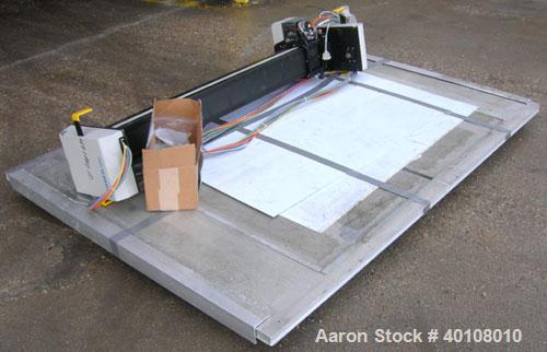 Used: Gerber cutting edge digital cutting system, model  DCS2500. Designed as a table top size plotter/cutter. Includes a model DCS2500 carriage assembly,65" wide x 96" long reverse air hold down tab...