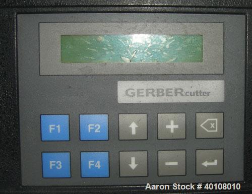 Used: Gerber cutting edge digital cutting system, model  DCS2500. Designed as a table top size plotter/cutter. Includes a model DCS2500 carriage assembly,65" wide x 96" long reverse air hold down tab...