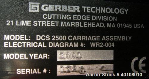 Used: Gerber cutting edge digital cutting system, model  DCS2500. Designed as a table top size plotter/cutter. Includes a model DCS2500 carriage assembly,65" wide x 96" long reverse air hold down tab...