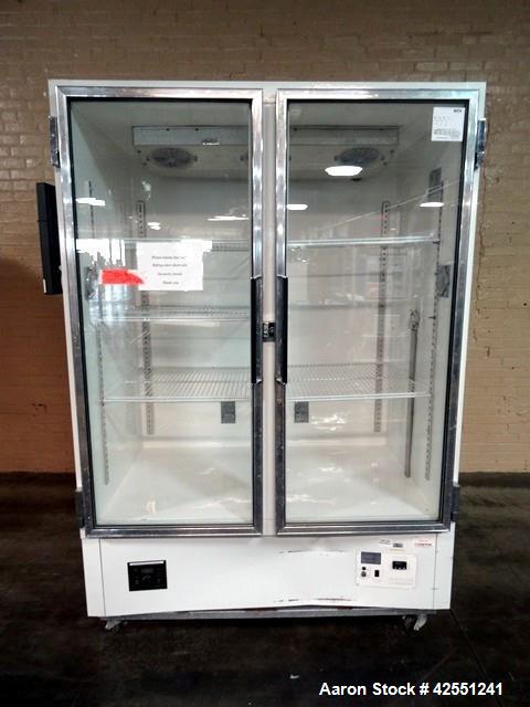 Used Jordon Scientific Freezer, Model FT-2-BRGCH-V2. Dual sided with dual glass doors, approximately 23" wide x 25" deep shelf spacing. Has 1/3 hp compressor with R134a refrigerant. 115 volt. Serial#...