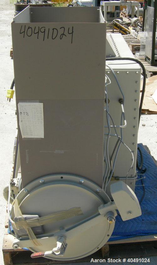 Used Vacuum Atmosphere Company glove box, model HE-493/MO-5. 50/60 hz, 110 volt, 5 amp. Rated plus 10 psig. Includes a model AMO-2032 moisture/ oxygen analyzer, AO- calibration panel, and a model PC-...