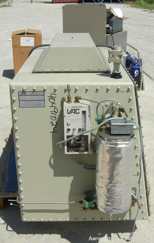 Used Vacuum Atmosphere Company glove box, model HE-493/MO-5. 50/60 hz, 110 volt, 5 amp. Rated plus 10 psig. Includes a model AMO-2032 moisture/ oxygen analyzer, AO- calibration panel, and a model PC-...