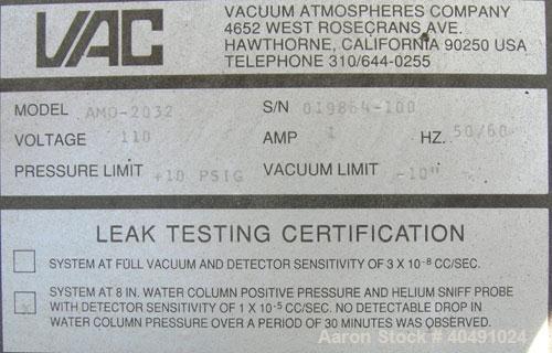 Used Vacuum Atmosphere Company glove box, model HE-493/MO-5. 50/60 hz, 110 volt, 5 amp. Rated plus 10 psig. Includes a model AMO-2032 moisture/ oxygen analyzer, AO- calibration panel, and a model PC-...