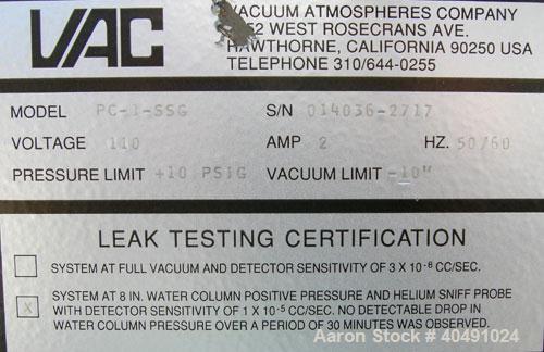 Used Vacuum Atmosphere Company glove box, model HE-493/MO-5. 50/60 hz, 110 volt, 5 amp. Rated plus 10 psig. Includes a model AMO-2032 moisture/ oxygen analyzer, AO- calibration panel, and a model PC-...