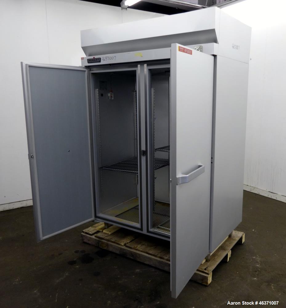 Used Hobart Two Section Medium Temperature Refrigerator, Model Q2. 48.9 Cubic feet capacity, approximate interior dimension 50-1/2" wide x 59" tall x 28" deep. 1/60/120 volt, 11.2 amp. 8 Ounce charge...