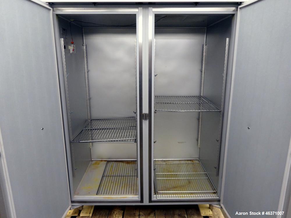 Used Hobart Two Section Medium Temperature Refrigerator, Model Q2. 48.9 Cubic feet capacity, approximate interior dimension 50-1/2" wide x 59" tall x 28" deep. 1/60/120 volt, 11.2 amp. 8 Ounce charge...