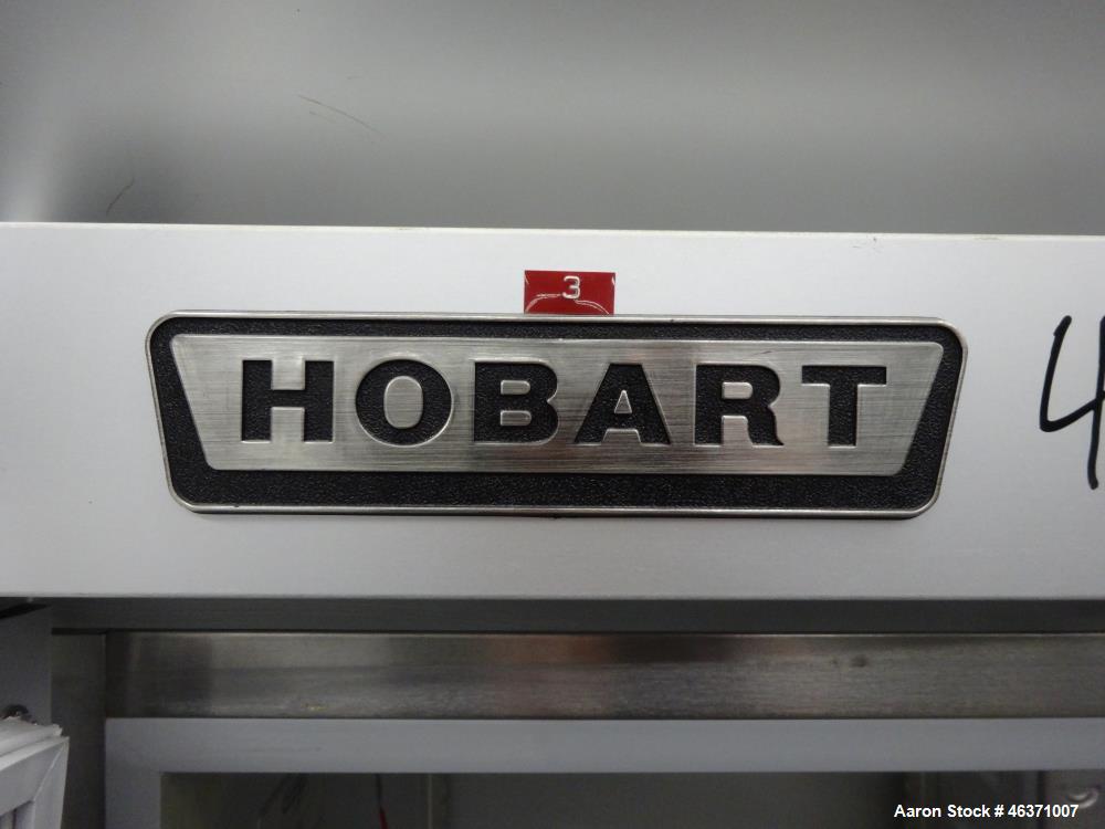 Used Hobart Two Section Medium Temperature Refrigerator, Model Q2. 48.9 Cubic feet capacity, approximate interior dimension 50-1/2" wide x 59" tall x 28" deep. 1/60/120 volt, 11.2 amp. 8 Ounce charge...