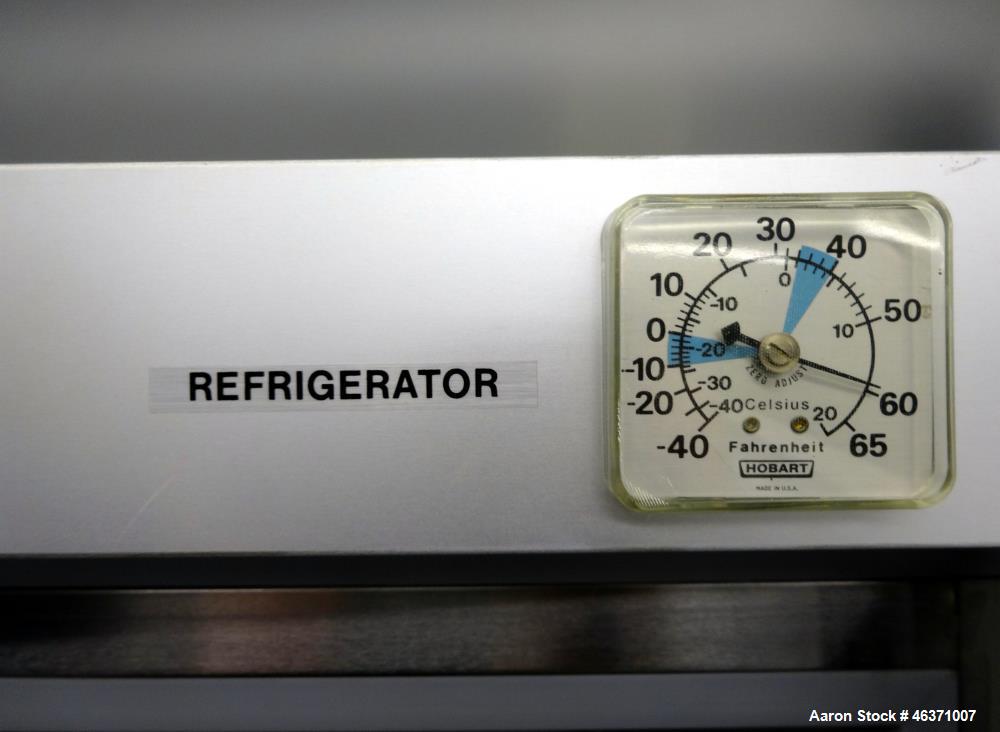 Used Hobart Two Section Medium Temperature Refrigerator, Model Q2. 48.9 Cubic feet capacity, approximate interior dimension 50-1/2" wide x 59" tall x 28" deep. 1/60/120 volt, 11.2 amp. 8 Ounce charge...