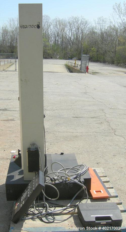 Used Instron tensile tester, model 1122.  Designed and used for testing the physical properties and stretching capabilities of plastics.  Rated 5 KN.  Manually operated clamps. Includes model 4400 di...