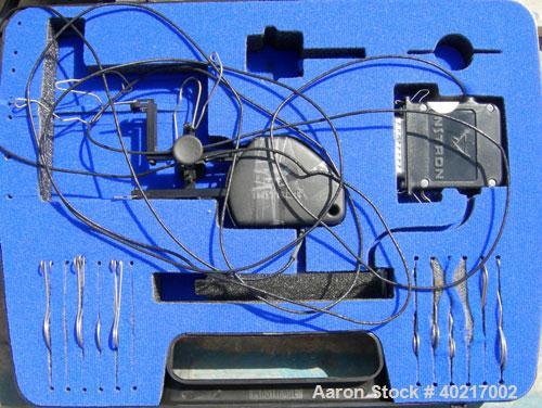 Used Instron tensile tester, model 1122.  Designed and used for testing the physical properties and stretching capabilities of plastics.  Rated 5 KN.  Manually operated clamps. Includes model 4400 di...