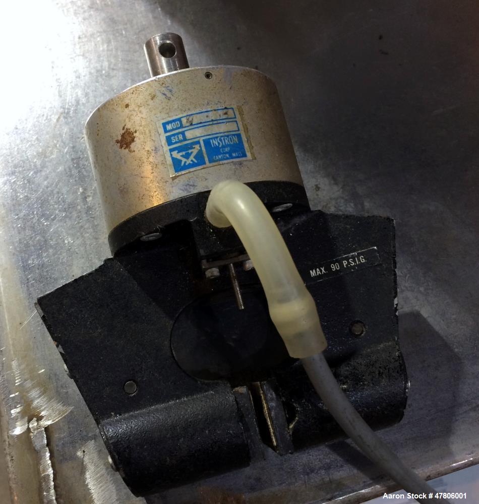 Used Instron 1120 Series Tensile Tester, Model 1122. Designed and used for testing the physical properties and stretching capabilities of plastics. Tension load ranges 10 (0.1N) to 1000 pounds (5 kN)...