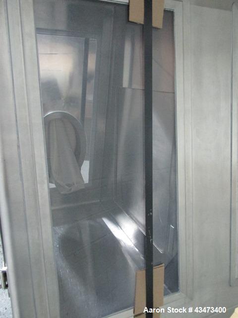 Used La Calhene Isolator, Stainless Steel. Approximately 63" long x 32" wide x 36" high chamber, dual sided with (3) gloves each side, 18" long anti chamber, 16" diameter end access door on stand wit...