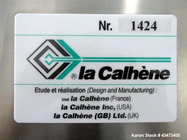 Used La Calhene Isolator, Stainless Steel. Approximately 63" long x 32" wide x 36" high chamber, dual sided with (3) gloves each side, 18" long anti chamber, 16" diameter end access door on stand wit...
