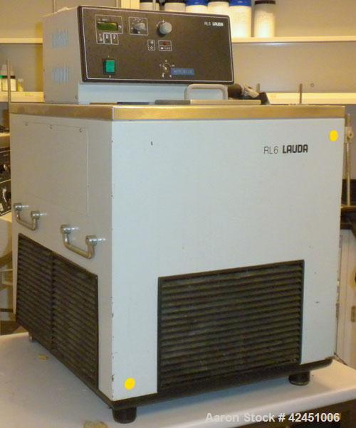 Used Lauda Circulator, Model RLS6. Chamber measures 10" long x 4 1/2" wide x 6" deep. Front mounted digital display with temperature controls 0 - 100 degrees C. 2.1 KW, 50/60 Hertz, 230 Volt. Serial ...