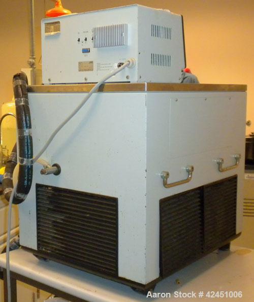 Used Lauda Circulator, Model RLS6. Chamber measures 10" long x 4 1/2" wide x 6" deep. Front mounted digital display with temperature controls 0 - 100 degrees C. 2.1 KW, 50/60 Hertz, 230 Volt. Serial ...