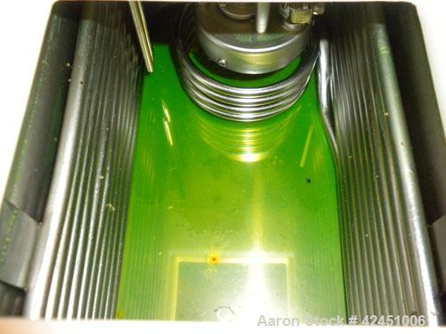 Used Lauda Circulator, Model RLS6. Chamber measures 10" long x 4 1/2" wide x 6" deep. Front mounted digital display with temperature controls 0 - 100 degrees C. 2.1 KW, 50/60 Hertz, 230 Volt. Serial ...