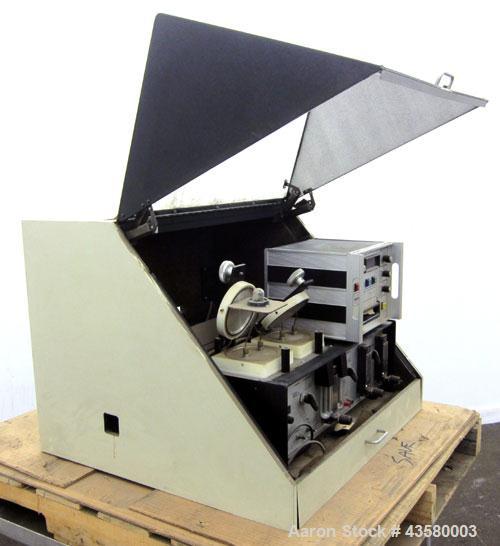 Used Mocon Ox-Tran Twin Oxygen Permeation Measuring Machine, Part# 001-050. Includes a Mocon oxygen transmission rate datalogger, model DL-200, part# 140-029, serial# 0588519, and a Jensen sound cabi...