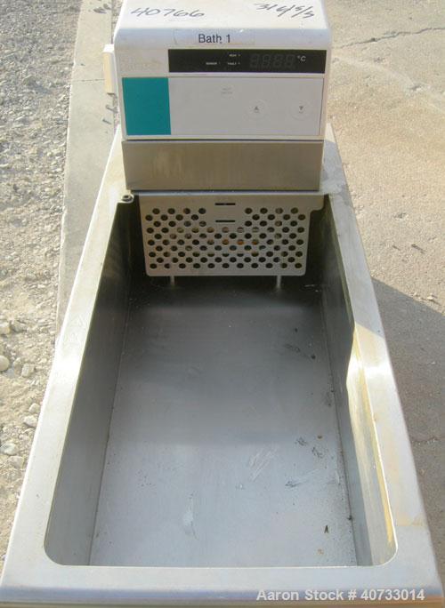Used Neslab model EX-411 bath circulator, 5.8 gallon capacity, 316 stainless steel.  Bath work area 19 1/4" long x 10" wide x 6" deep.  800 watt heater, temperature range 15 degrees C to 150 degrees ...