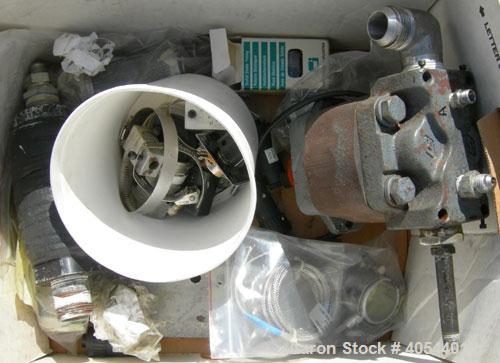 Used Premelters Inc hot melt, 304 stainless steel. 16" X 16" X approximately 24" deep chamber with (4) heating zones, approximately 1 1/2" center bottom outlet with a 1 hp, 180 volt, 1725 rpm DC moto...