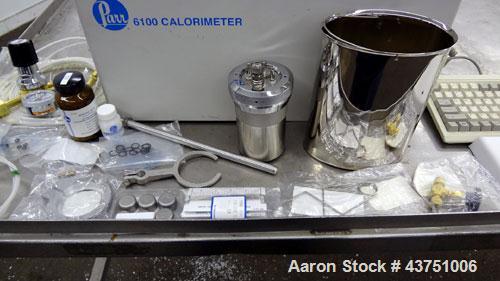 Used Parr 6100 Oxygen Bomb Calorimeter. The Parr 6100 Compensated Jacket Calorimeter continuously monitors the temperature surrounding the calorimeter and applies the necessary heat leak correction i...