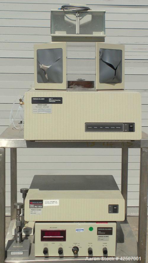 Used Perkin-Elmer Differential Scanning Calorimeter, Model DSC-7. Rated 30 degrees C to 720 degrees C (86 - 1328 degrees F). Plexiglass chamber with sample holder. Includes an autobalance and a model...