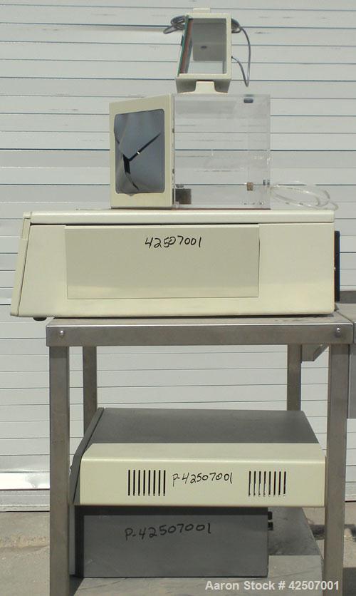 Used Perkin-Elmer Differential Scanning Calorimeter, Model DSC-7. Rated 30 degrees C to 720 degrees C (86 - 1328 degrees F). Plexiglass chamber with sample holder. Includes an autobalance and a model...