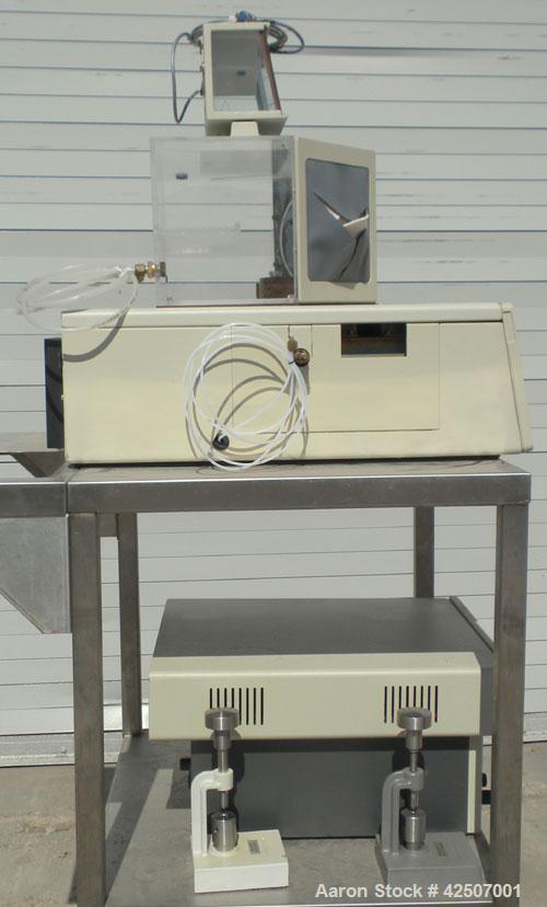 Used Perkin-Elmer Differential Scanning Calorimeter, Model DSC-7. Rated 30 degrees C to 720 degrees C (86 - 1328 degrees F). Plexiglass chamber with sample holder. Includes an autobalance and a model...