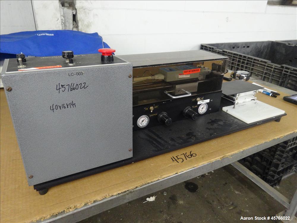 Used Vinatoru Enterprises Tensile/Strength Tester, Model RFD. Can test trays with sides over 1-1/4" and up to 3-1/2" depth. 100% pneumatic grippers, 11 3/4" maximum cross head travel. Multi speed dri...