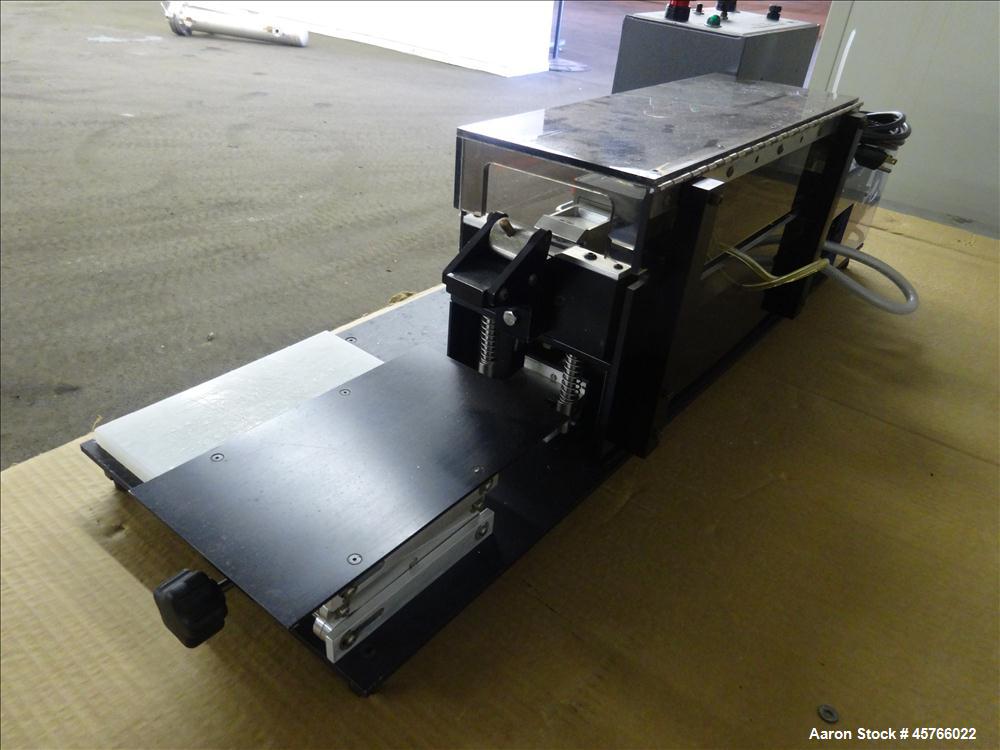 Used Vinatoru Enterprises Tensile/Strength Tester, Model RFD. Can test trays with sides over 1-1/4" and up to 3-1/2" depth. 100% pneumatic grippers, 11 3/4" maximum cross head travel. Multi speed dri...
