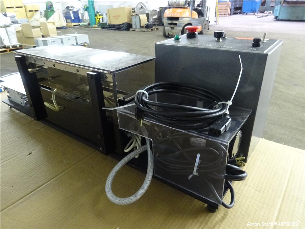 Used Vinatoru Enterprises Tensile/Strength Tester, Model RFD. Can test trays with sides over 1-1/4" and up to 3-1/2" depth. 100% pneumatic grippers, 11 3/4" maximum cross head travel. Multi speed dri...