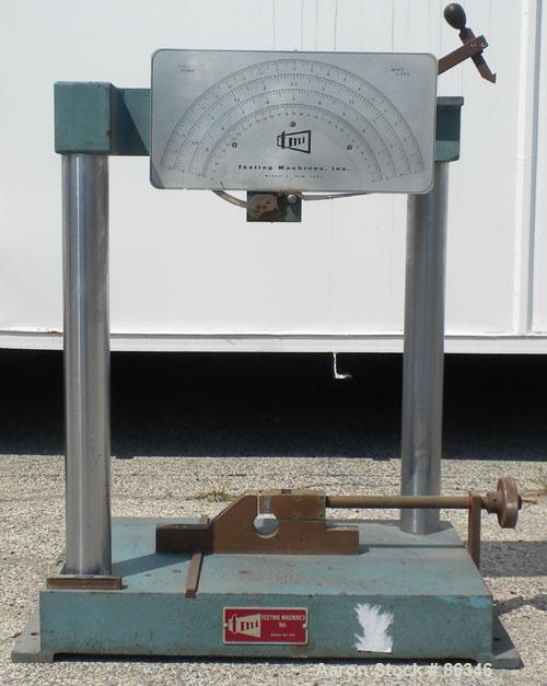 Used TMI Pendulum Impact Tester. Approximately 11' per second. Requires pendulum arm.