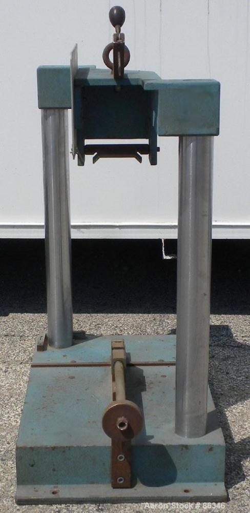 Used TMI Pendulum Impact Tester. Approximately 11' per second. Requires pendulum arm.