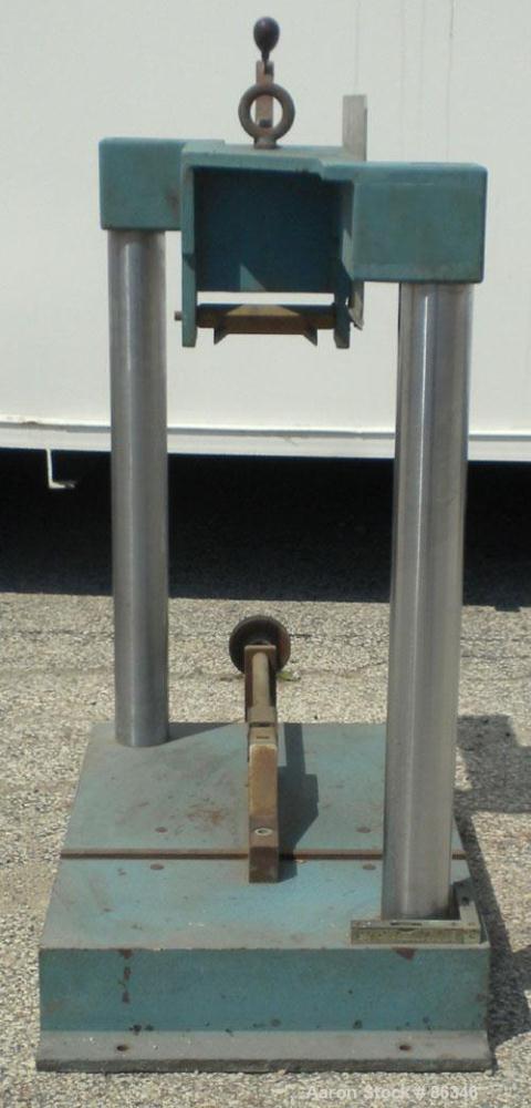 Used TMI Pendulum Impact Tester. Approximately 11' per second. Requires pendulum arm.