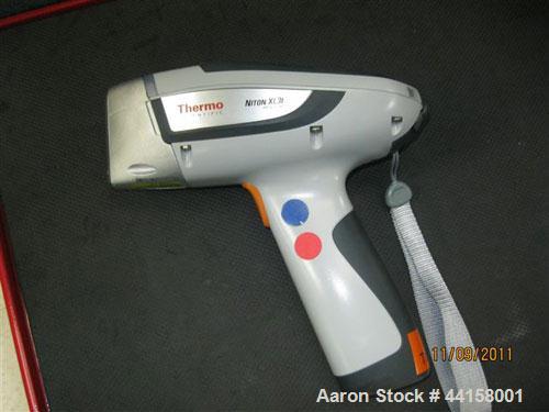 Used Thermo Scientific Niton XL3t Handheld X-Ray Fluorescence (XRF) Analyzer, Model XL3t 700.  Equipped with a 50 kV x-ray tube.  Provides approximately 2x the x-ray flux of a 40 kW x-ray tube.  Lowe...