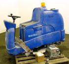 Used Clarke Alto Mini-Max Rider Floor Scrubber. Includes a battery charger, no batteries. Built 2002.