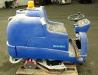 Used Clarke Alto Mini-Max Rider Floor Scrubber. Includes a battery charger, no batteries. Built 2002.
