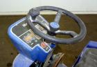 Used Clarke Alto Mini-Max Rider Floor Scrubber. Includes a battery charger, no batteries. Built 2002.