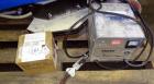 Used Clarke Alto Mini-Max Rider Floor Scrubber. Includes a battery charger, no batteries. Built 2002.