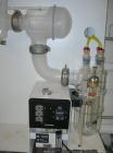 USED: Corning Glass Works Mega-Pure automatic water distillation unit, model MP-11A, glass construction. Production volume 13 liters per hour, cooling water capacity 130 liters per hour. (4) heaters,...