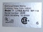 USED: Corning Glass Works Mega-Pure automatic water distillation unit, model MP-11A, glass construction. Production volume 13 liters per hour, cooling water capacity 130 liters per hour. (4) heaters,...