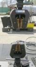 Used Instron tensile tester, model 1122.  Designed and used for testing the physical properties and stretching capabilities of plastics.  Rated 5 KN.  Manually operated clamps. Includes model 4400 di...