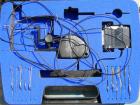 Used Instron tensile tester, model 1122.  Designed and used for testing the physical properties and stretching capabilities of plastics.  Rated 5 KN.  Manually operated clamps. Includes model 4400 di...