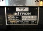 Used Instron 1120 Series Tensile Tester, Model 1122. Designed and used for testing the physical properties and stretching capabilities of plastics. Tension load ranges 10 (0.1N) to 1000 pounds (5 kN)...