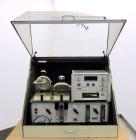 Used Mocon Ox-Tran Twin Oxygen Permeation Measuring Machine, Part# 001-050. Includes a Mocon oxygen transmission rate datalogger, model DL-200, part# 140-029, serial# 0588519, and a Jensen sound cabi...
