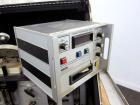 Used Mocon Ox-Tran Twin Oxygen Permeation Measuring Machine, Part# 001-050. Includes a Mocon oxygen transmission rate datalogger, model DL-200, part# 140-029, serial# 0588519, and a Jensen sound cabi...