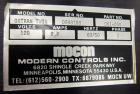 Used Mocon Ox-Tran Twin Oxygen Permeation Measuring Machine, Part# 001-050. Includes a Mocon oxygen transmission rate datalogger, model DL-200, part# 140-029, serial# 0588519, and a Jensen sound cabi...
