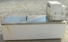 Used Neslab model EX-411 bath circulator, 5.8 gallon capacity, 316 stainless steel.  Bath work area 19 1/4