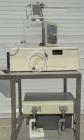 Used Perkin-Elmer Differential Scanning Calorimeter, Model DSC-7. Rated 30 degrees C to 720 degrees C (86 - 1328 degrees F). Plexiglass chamber with sample holder. Includes an autobalance and a model...